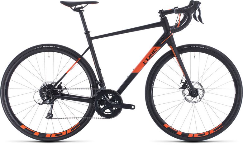 Bicykel CUBE Attain Pro black'n'orange 2020
